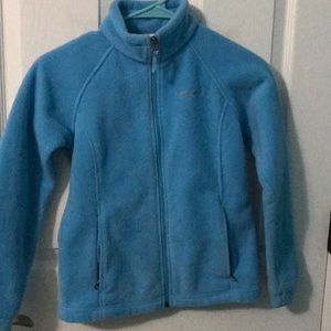 A gently used Columbia jacket that is Sky Blue.